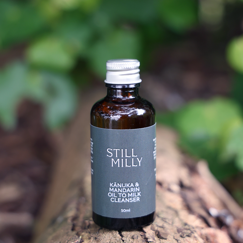 Kānuka and Mandarin oil to milk cleanser refill in amber glass bottle by Still Milly